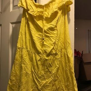 A yellow strapless sun dress